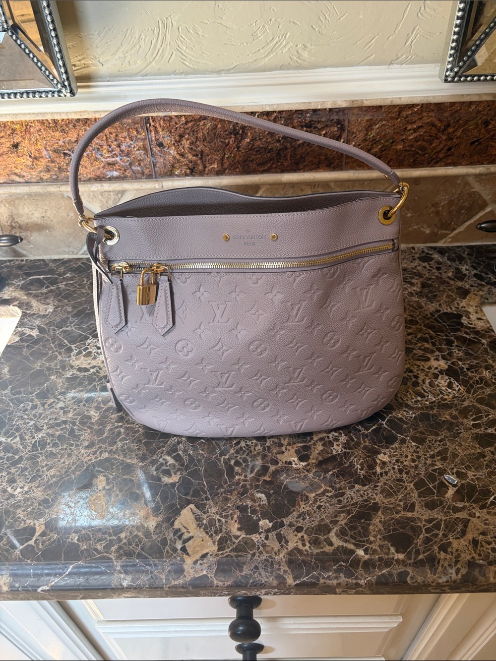 Louis Vuitton Taupe Empreinte Spontini Shoulder Bag with Gold Hardware.